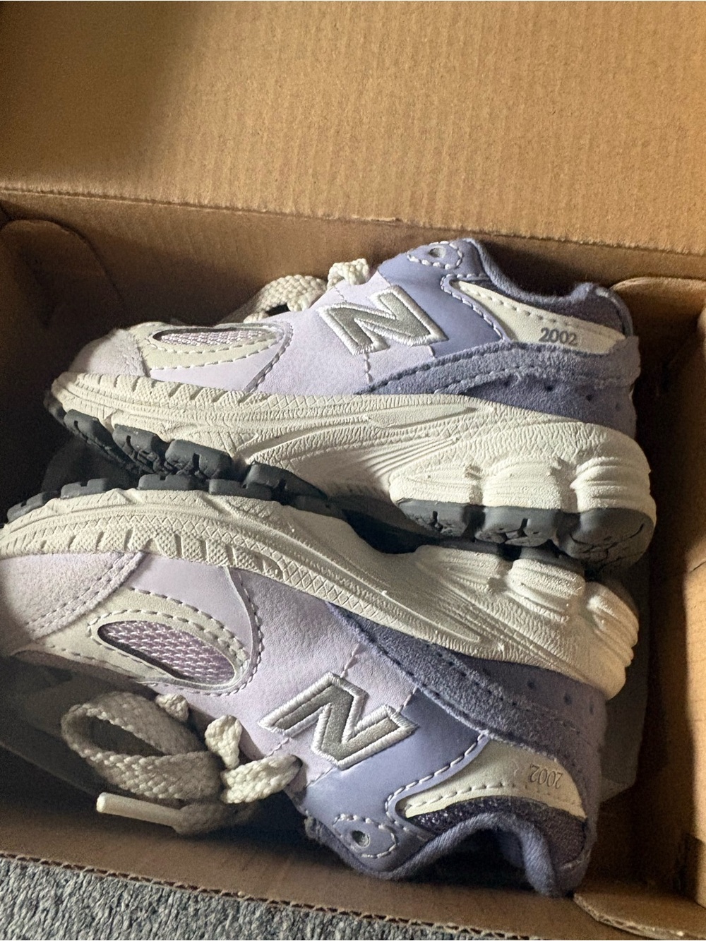 New Balance Kids Lavender and White Sneakers